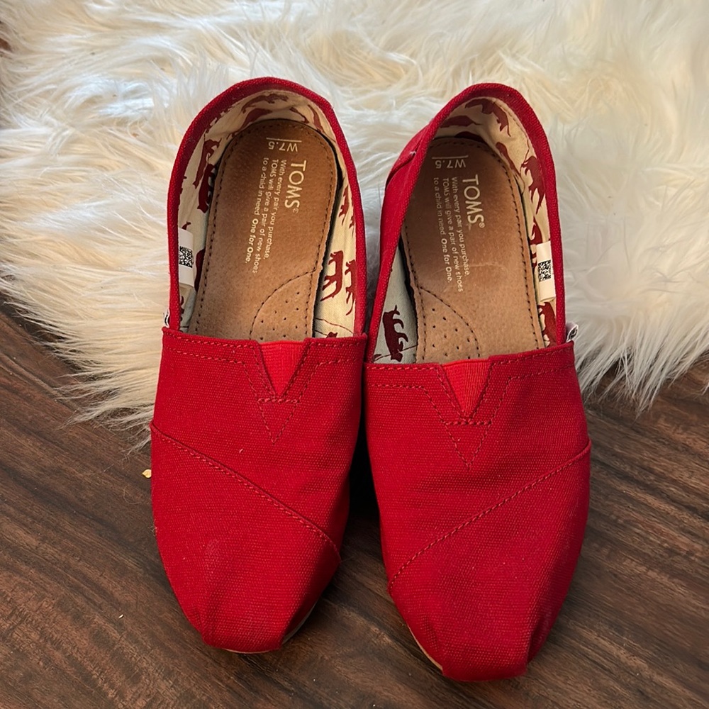 TOMS red slip ons